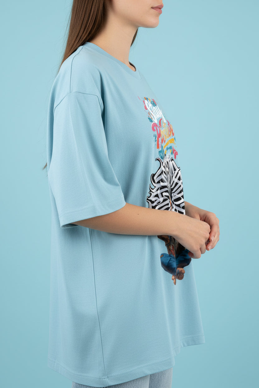 ZotRage baby blue heavyweight cotton oversized t-shirt featuring a graphic of a meditating man with Stay Positive text