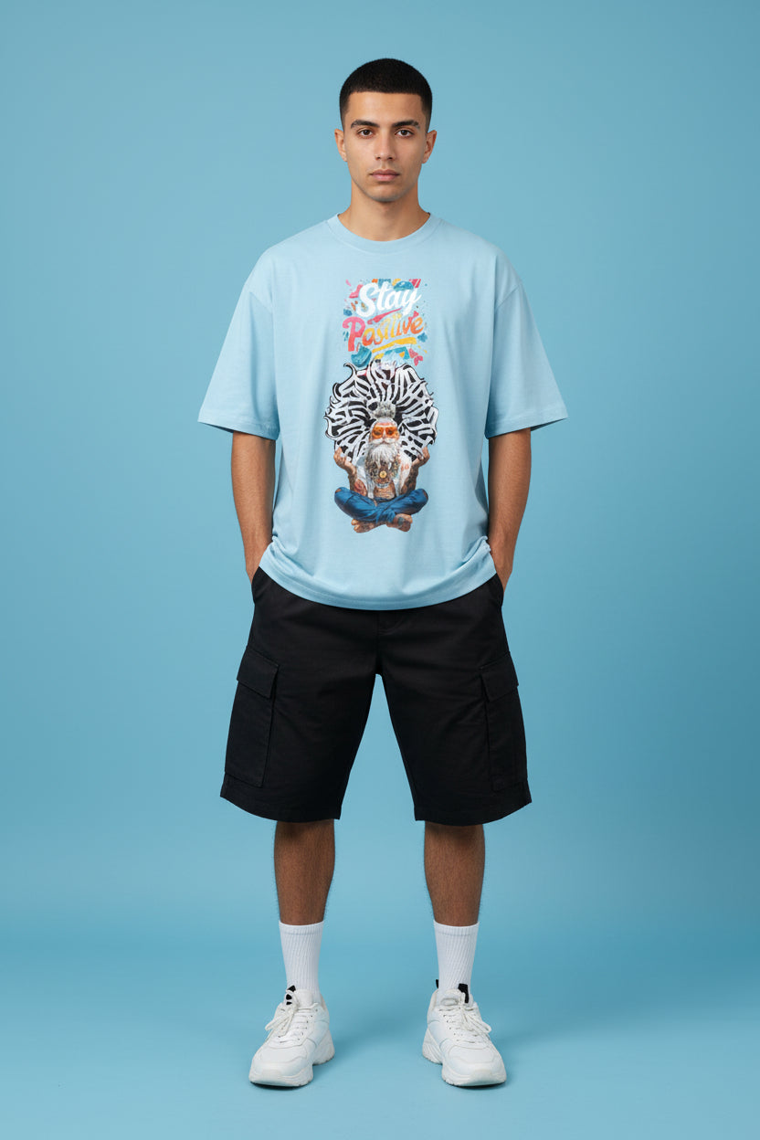 ZotRage baby blue oversized cotton t-shirt featuring a graphic print of a meditating man with a zebra pattern aura