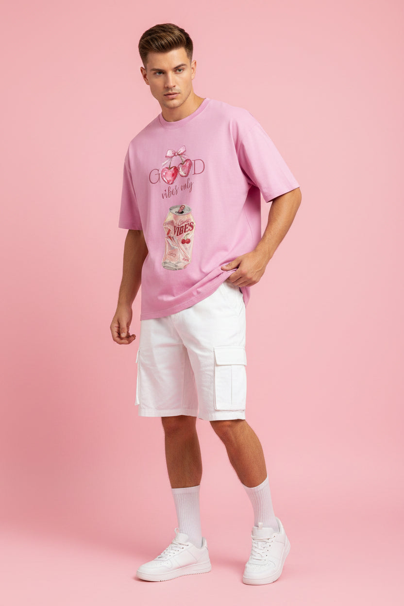 ZotRage baby pink oversized t-shirt featuring a cherry soda can graphic and Good Vibes Only text print.