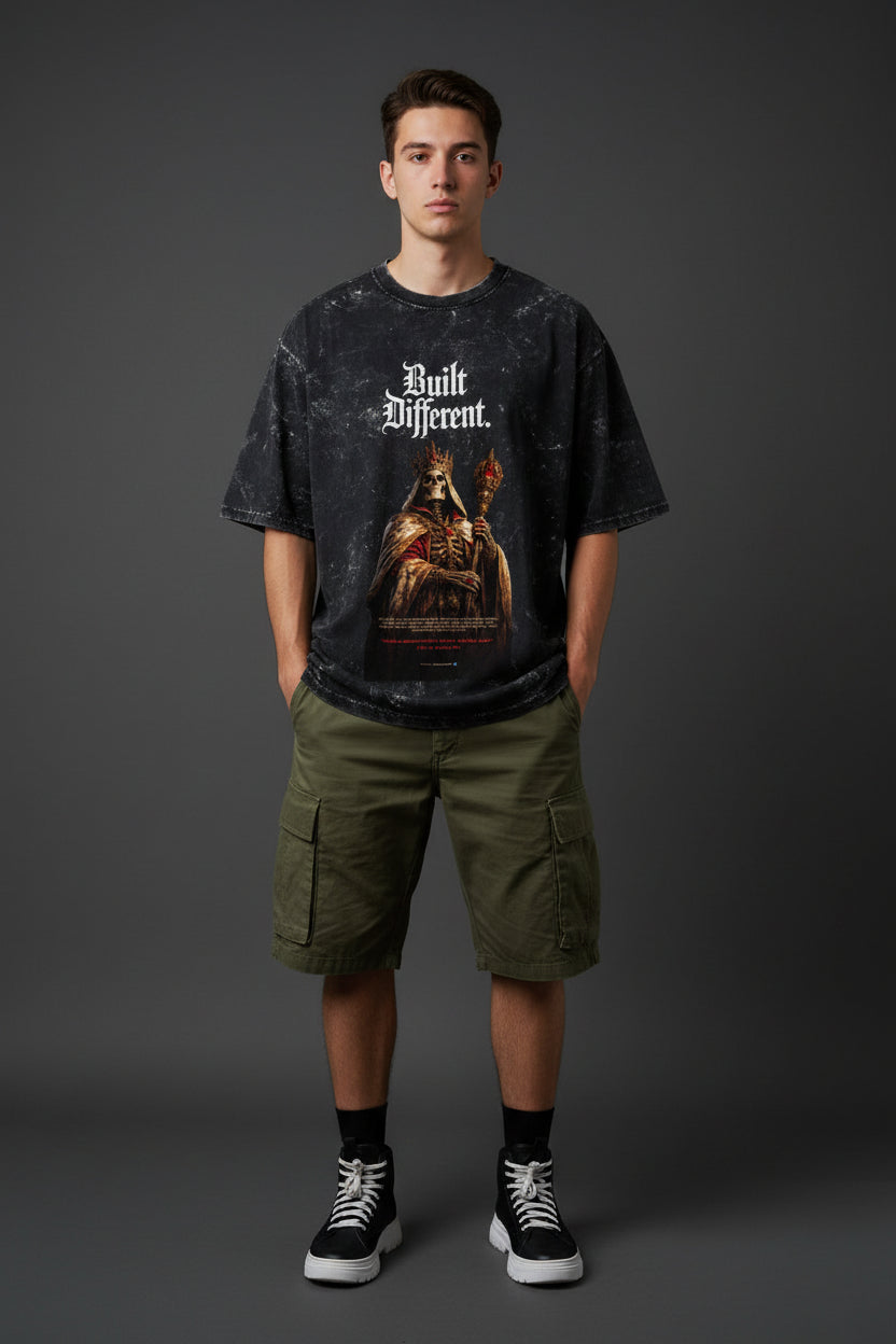 ZotRage black acid-washed oversized cotton t-shirt featuring a graphic print of a skeleton king with a crown.