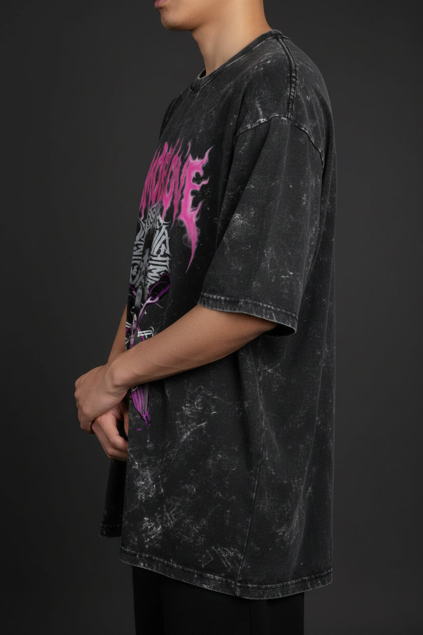 ZotRage black acid-washed oversized cotton t-shirt featuring a pink and white graphic print of a statue and text.