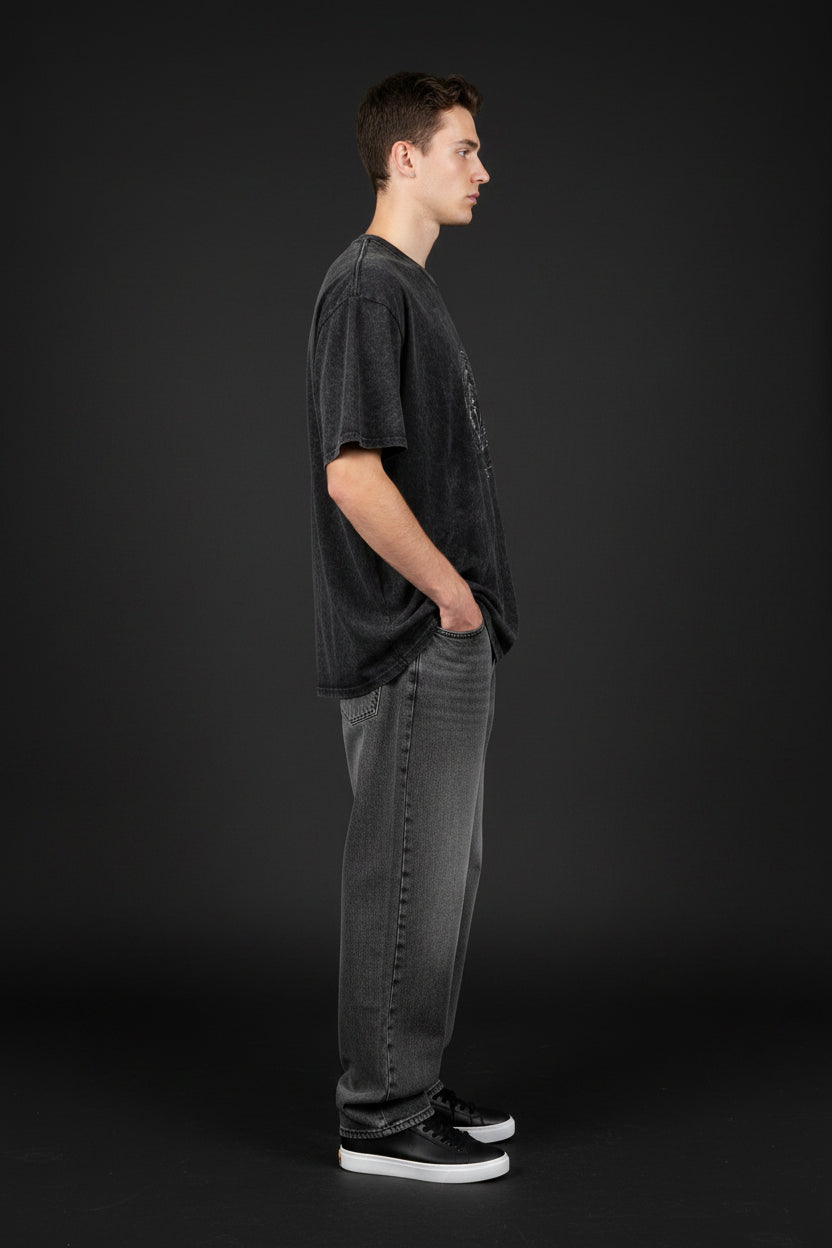 ZotRage black acidwash oversized t-shirt featuring a white circular Om symbol graphic print on the chest.