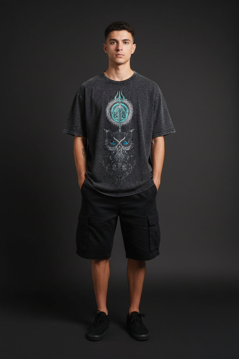 ZotRage black acidwash oversized t-shirt featuring a detailed owl and trident graphic with blue accents.