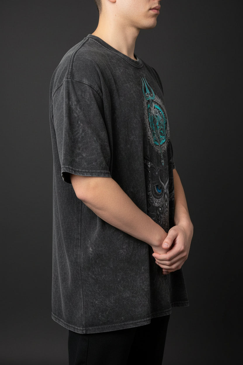 ZotRage black acidwash oversized t-shirt featuring a detailed owl and trident graphic with blue accents.