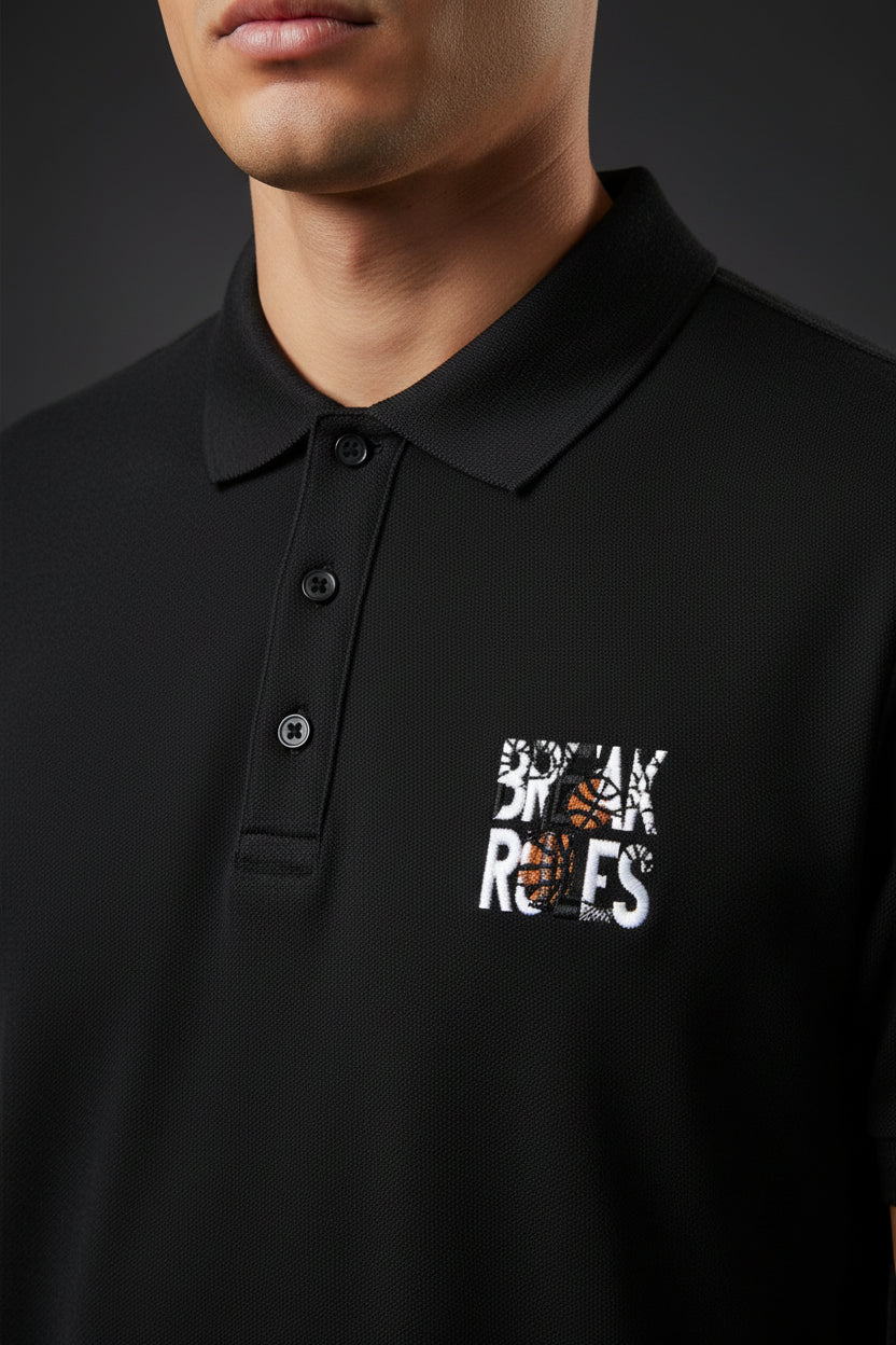 ZotRage black cotton Airtex polo shirt with a structured collar and Break Rules graphic on the chest.