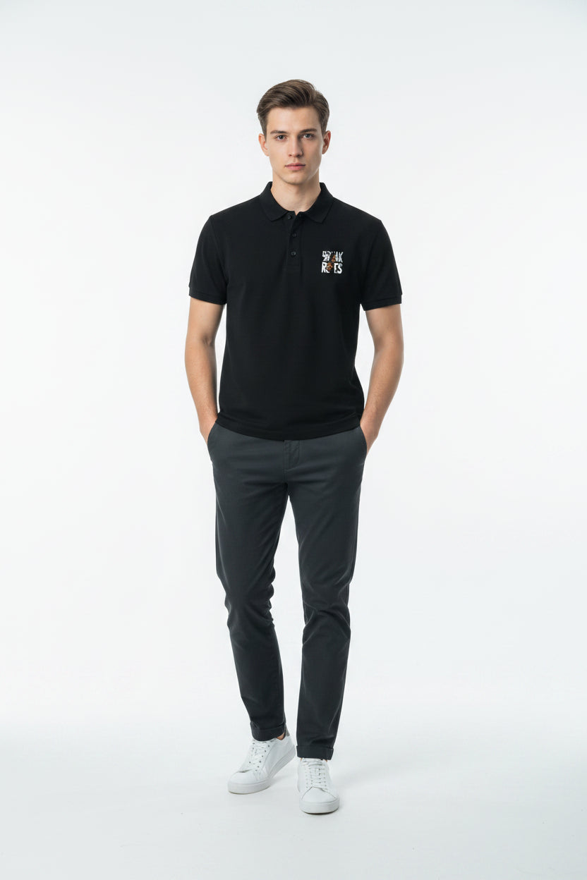 ZotRage black cotton Airtex polo shirt with a structured collar and Break Rules graphic on the chest.