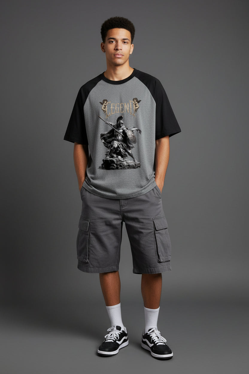 ZotRage black and charcoal melange oversized cotton raglan t-shirt with a graphic warrior print on the front.