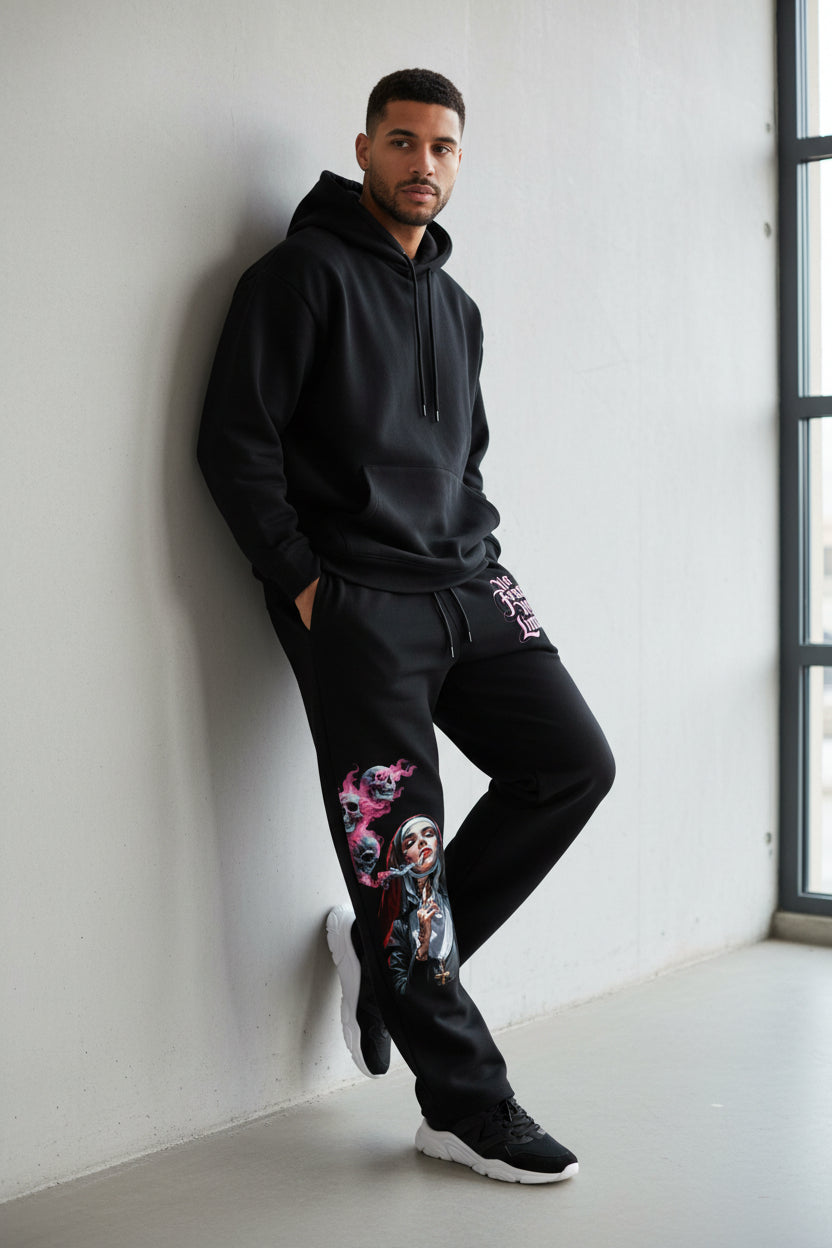 ZotRage black cotton joggers featuring a graphic of a smoking nun with skulls and No Fear No Limit text