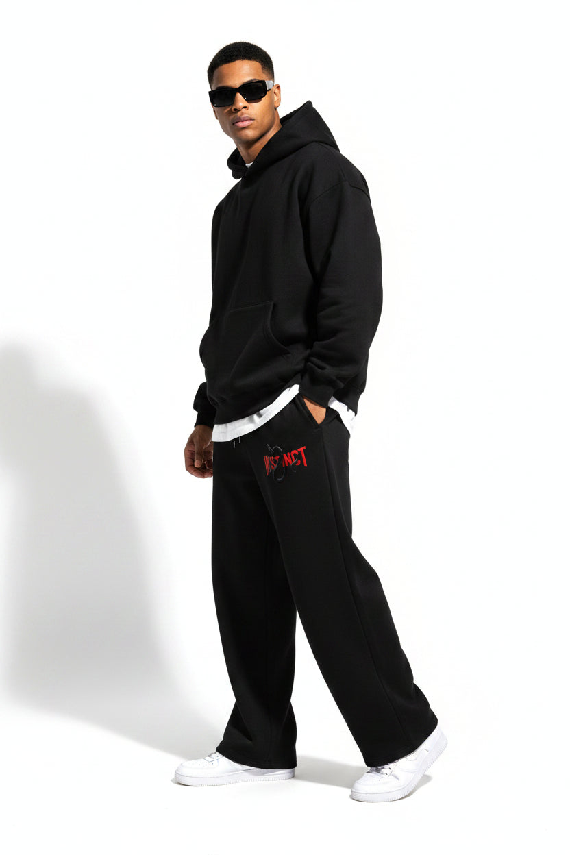 ZotRage black cotton joggers featuring a red Instinct logo and snake graphic on the front with an elastic drawstring