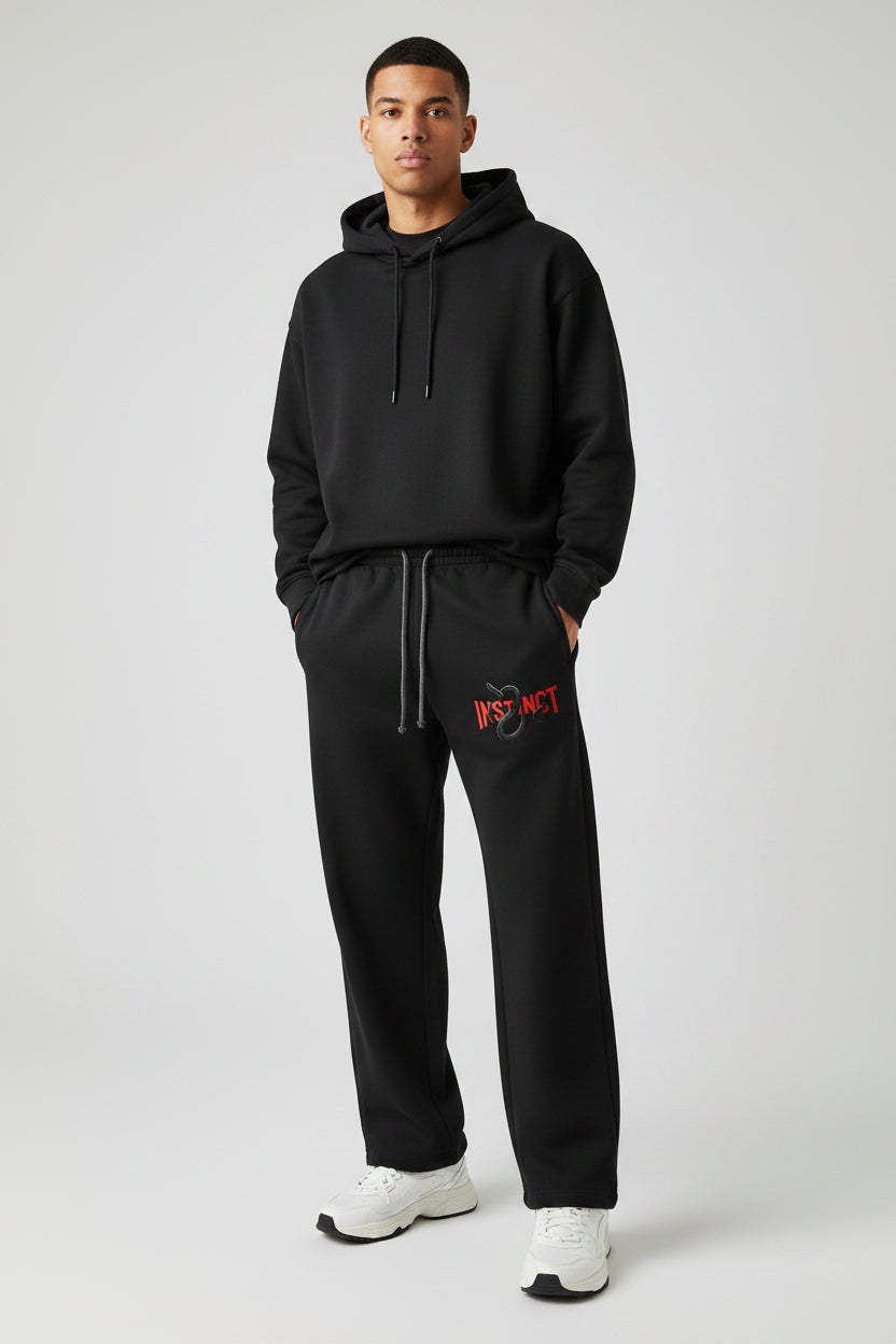 ZotRage black cotton joggers featuring a red Instinct text logo with a snake graphic on the left leg