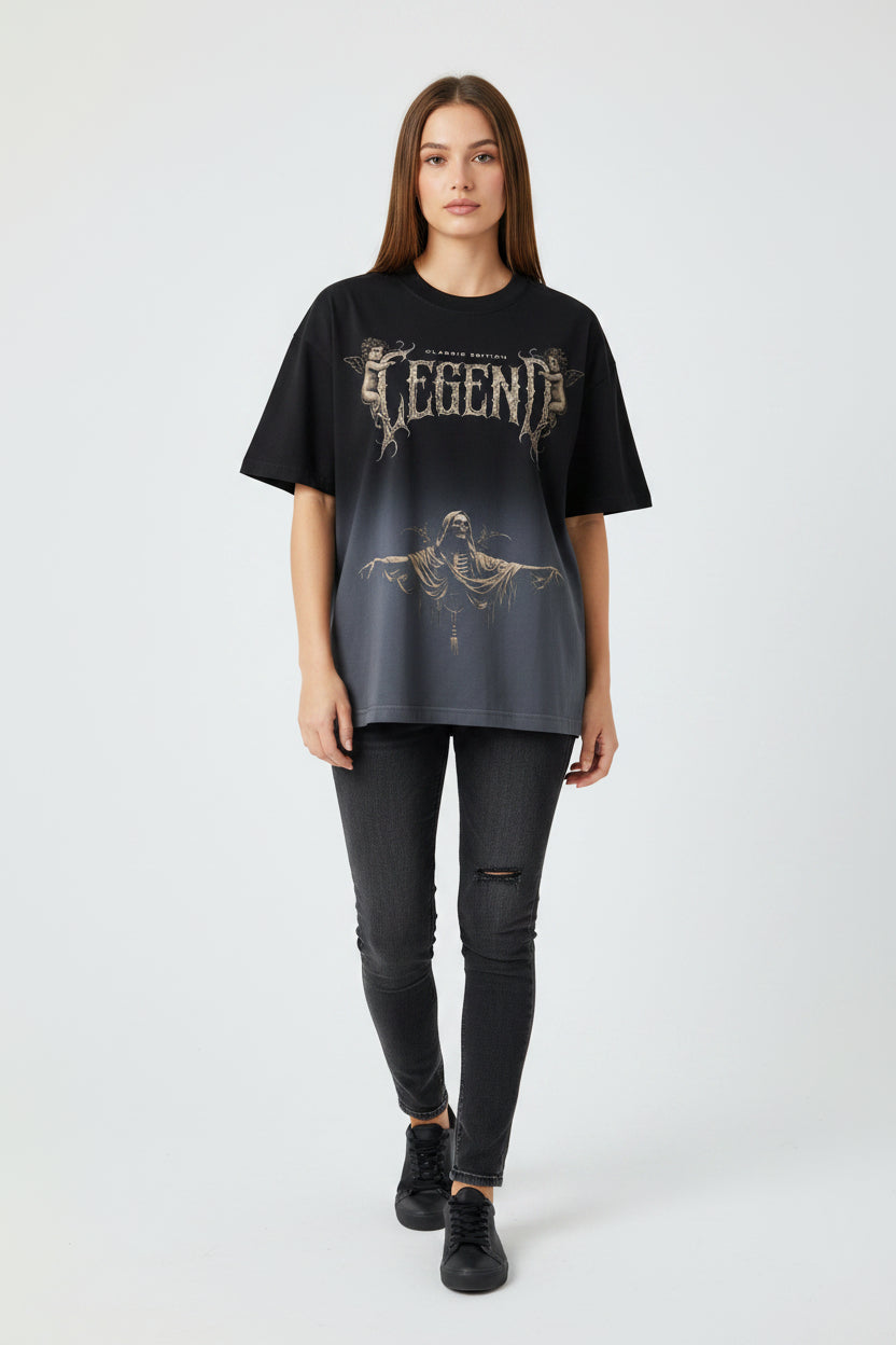 ZotRage black ombre boxy fit t-shirt featuring a vintage-style Legend graphic with cherubs and a grim reaper figure.