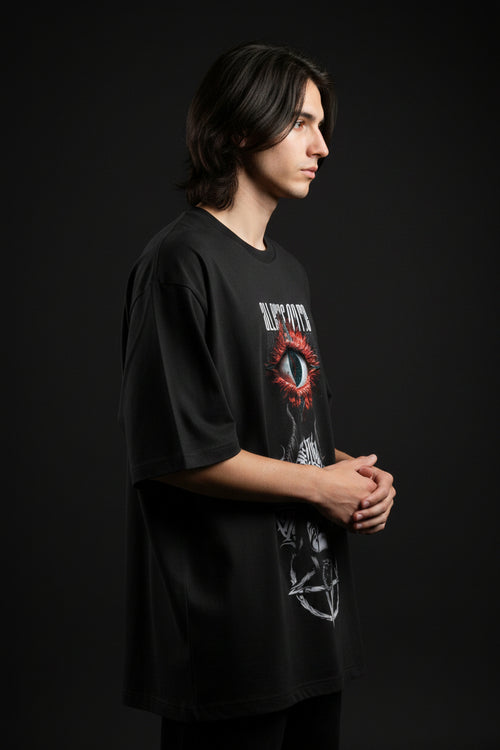 ZotRage black oversized t-shirt featuring a red eye graphic and gothic horned figure print on the chest