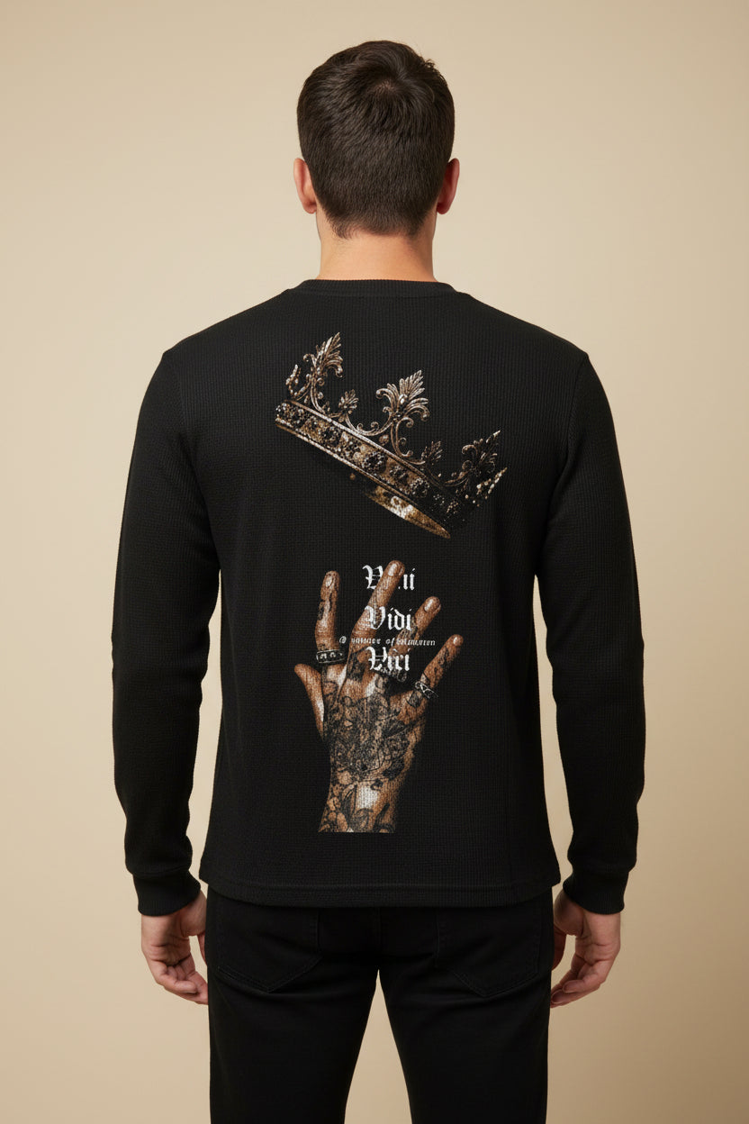 ZotRage black waffle knit long-sleeve shirt featuring a crown and tattooed hand graphic on the back