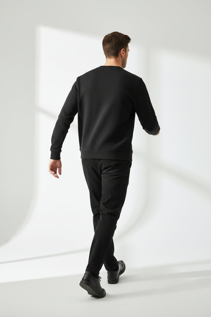 ZotRage black waffle knit long sleeve t-shirt with a relaxed oversized fit and textured cotton fabric back view