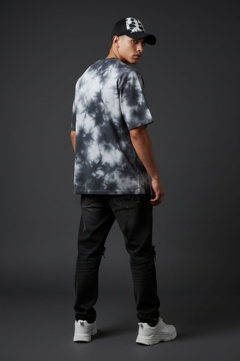 Back view of ZotRage oversized unisex t-shirt in black and white tie-dye cotton blend fabric