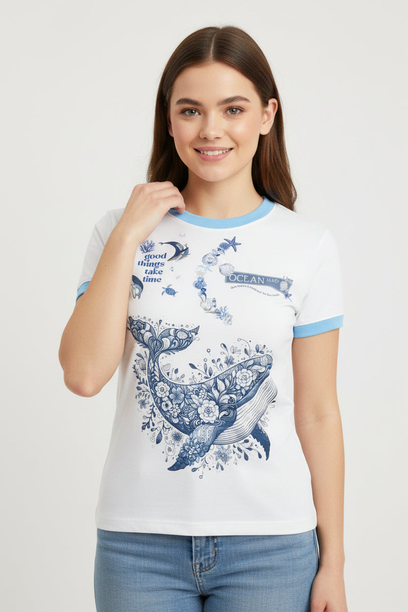 ZotRage white ringer t-shirt with blue trim and a detailed floral whale graphic with ocean-themed text elements.