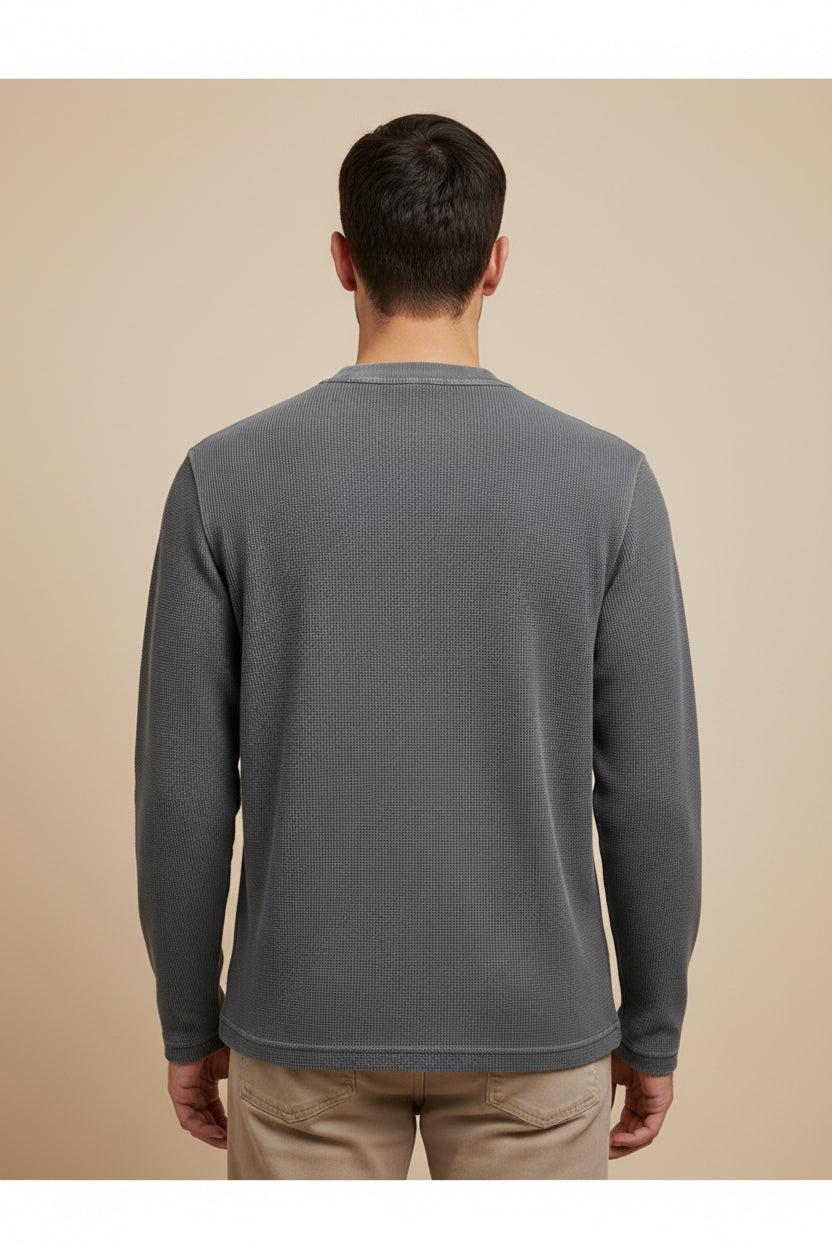 ZotRage charcoal grey acid-wash waffle knit long sleeve shirt with a relaxed oversized fit and textured cotton weave.