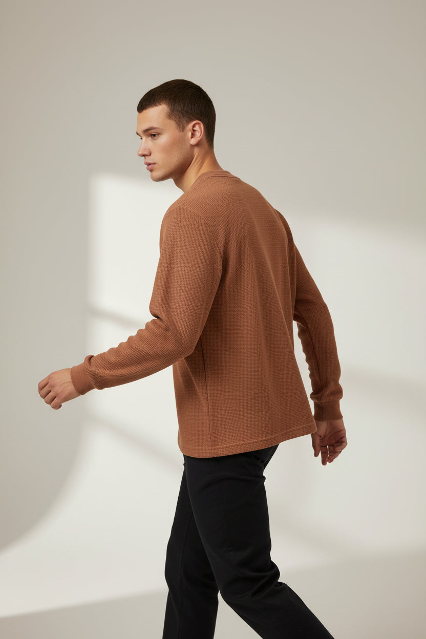 ZotRage cheetah brown waffle knit long sleeve shirt with a relaxed oversized fit and textured cotton fabric back view