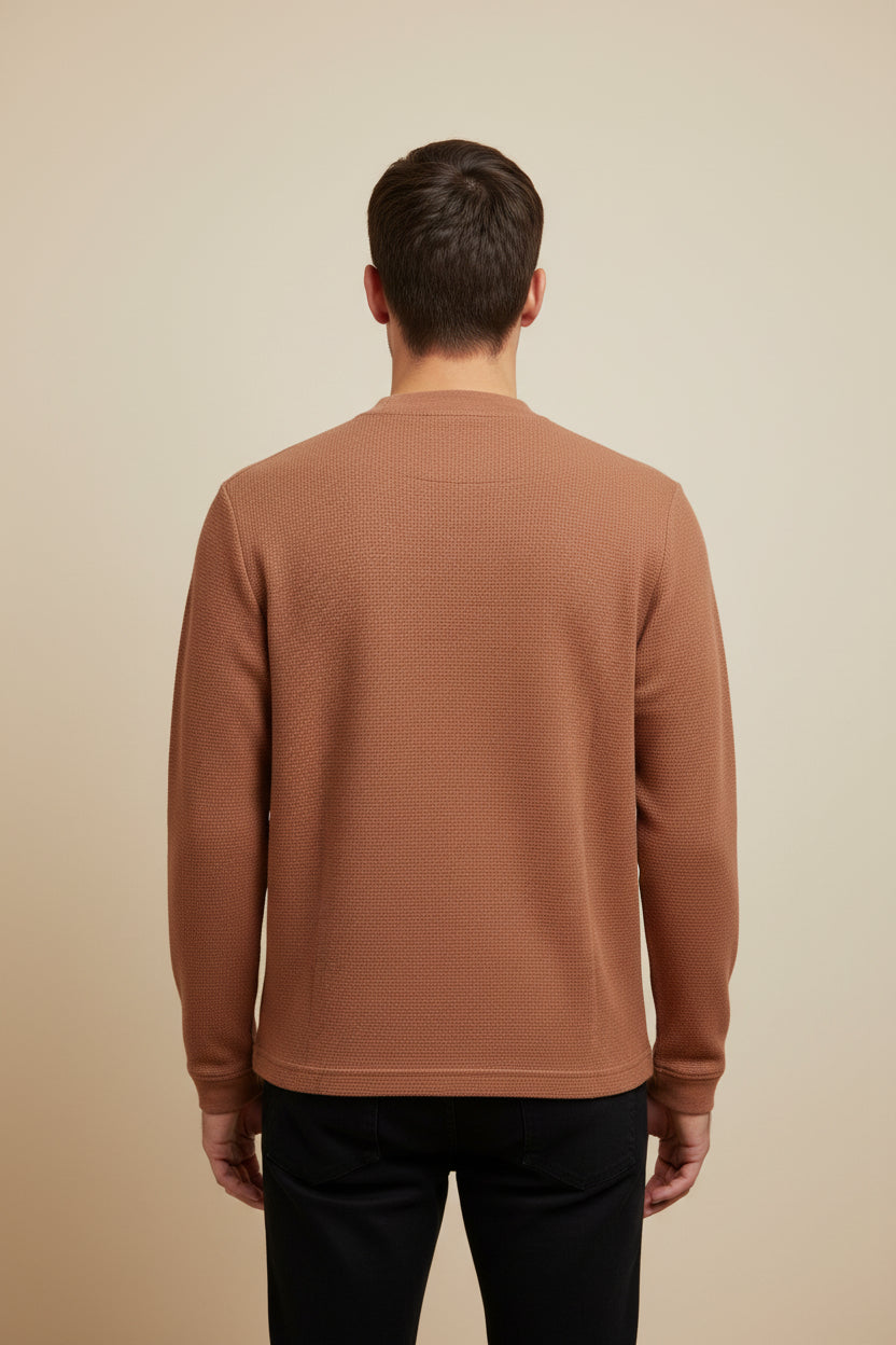 ZotRage cheetah brown waffle knit long sleeve shirt with a relaxed oversized fit and textured cotton fabric back view