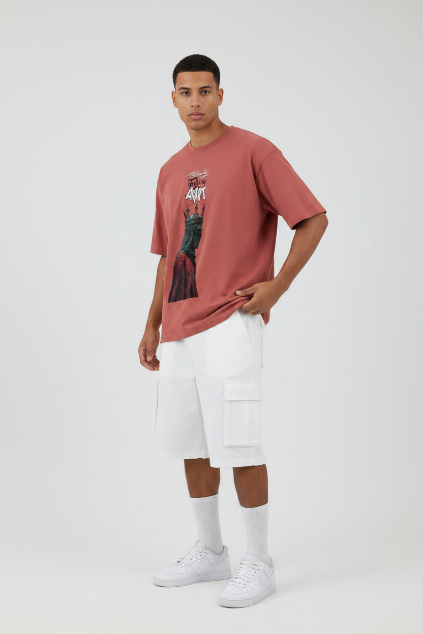 ZotRage coral red heavyweight cotton oversized t-shirt featuring a graphic of a crowned figure and text.