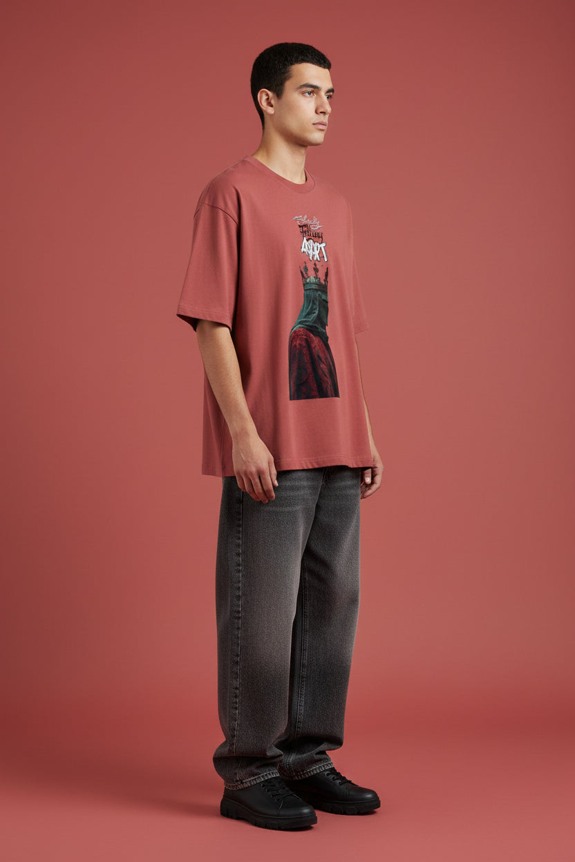 ZotRage coral red oversized heavyweight cotton t-shirt featuring a graphic of a crowned figure and Falling Apart text.