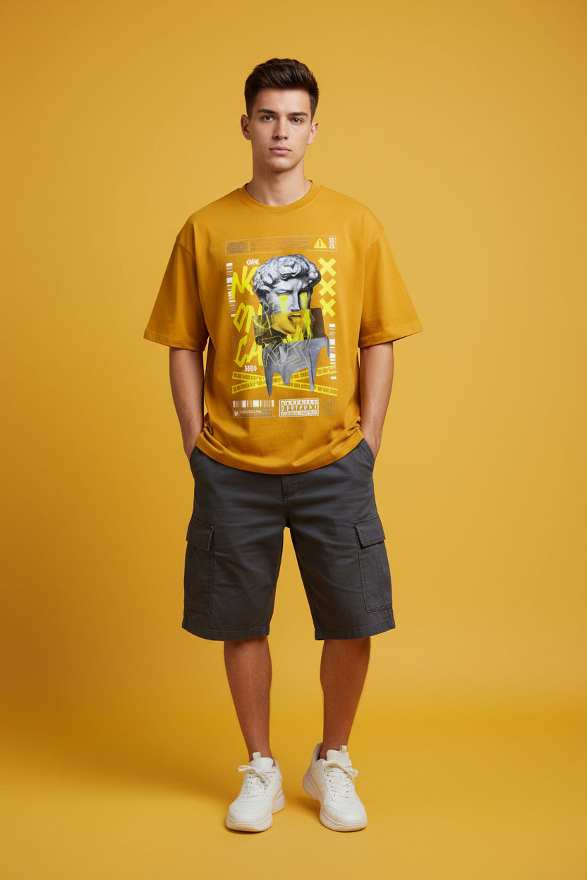 ZotRage golden yellow heavyweight cotton oversized t-shirt with graphic print of a crying statue and text