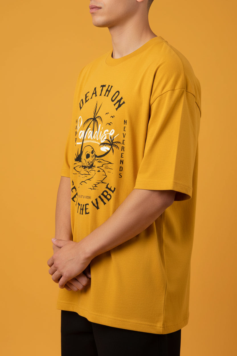 ZotRage golden yellow heavyweight cotton oversized t-shirt with black graphic print of a skull and palm tree