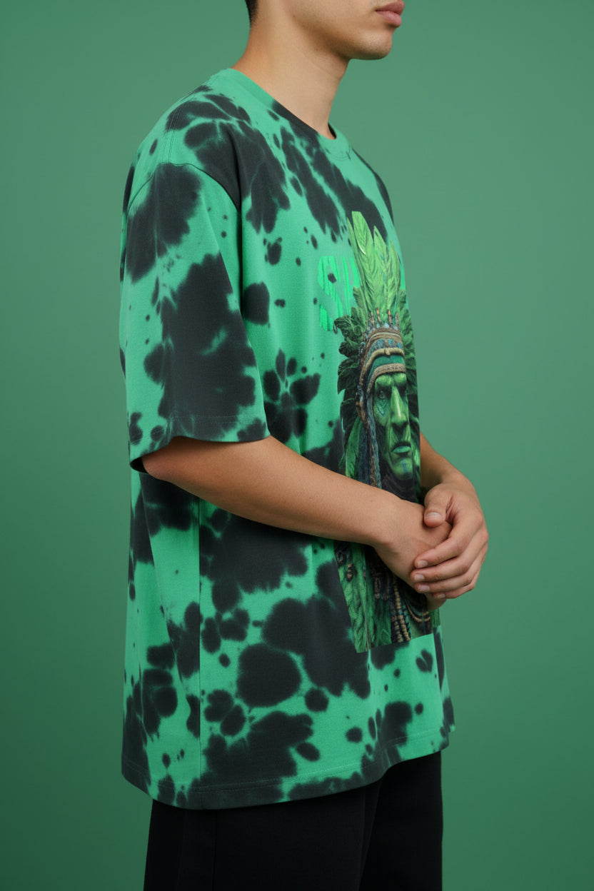 ZotRage green and black tie-dye oversized cotton blend t-shirt featuring a detailed indigenous warrior graphic print.
