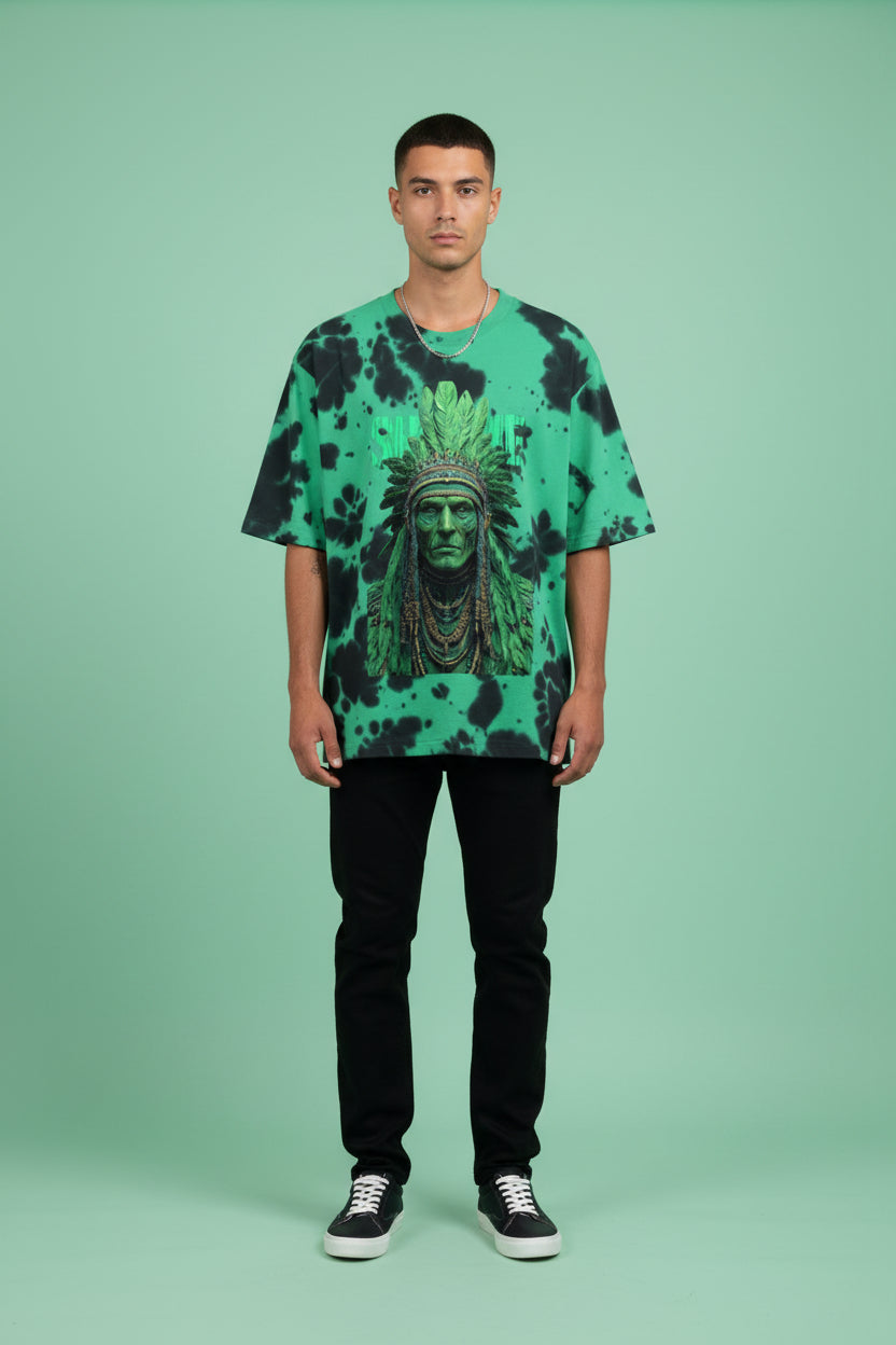 ZotRage oversized unisex t-shirt in green and black tie-dye with a graphic print of a tribal warrior in feathers