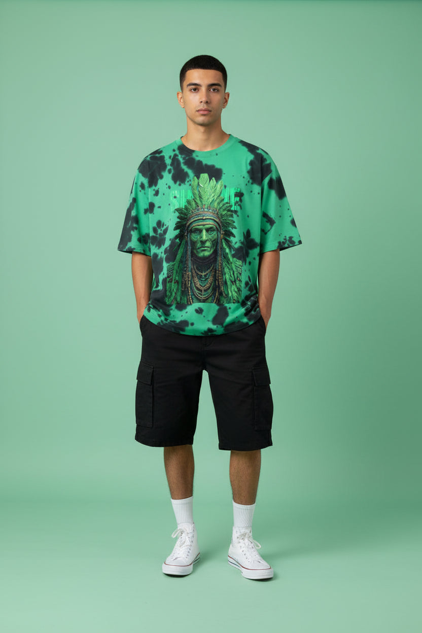 ZotRage oversized unisex t-shirt in green and black tie-dye with a detailed graphic print of a tribal warrior.