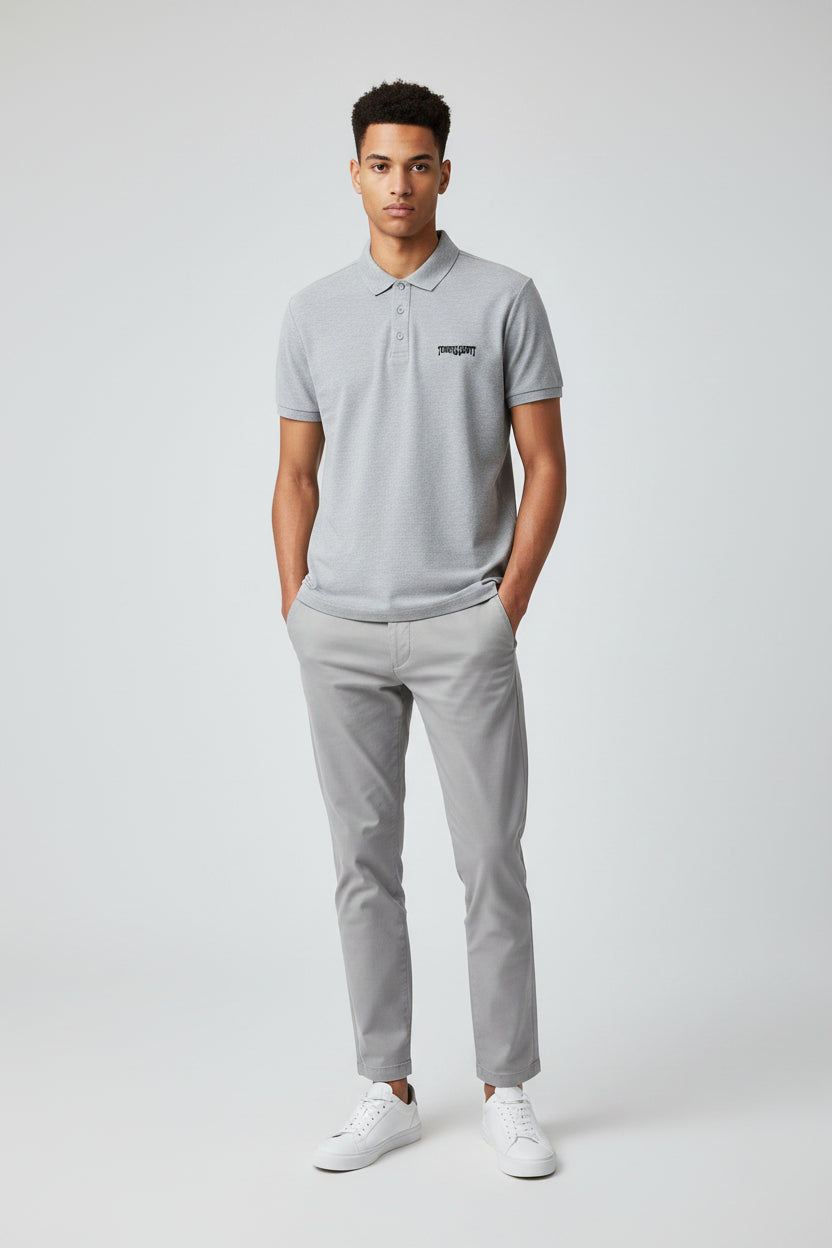 ZotRage grey melange Travis Scott polo shirt in 100% cotton Airtex fabric with a structured collar and button placket.