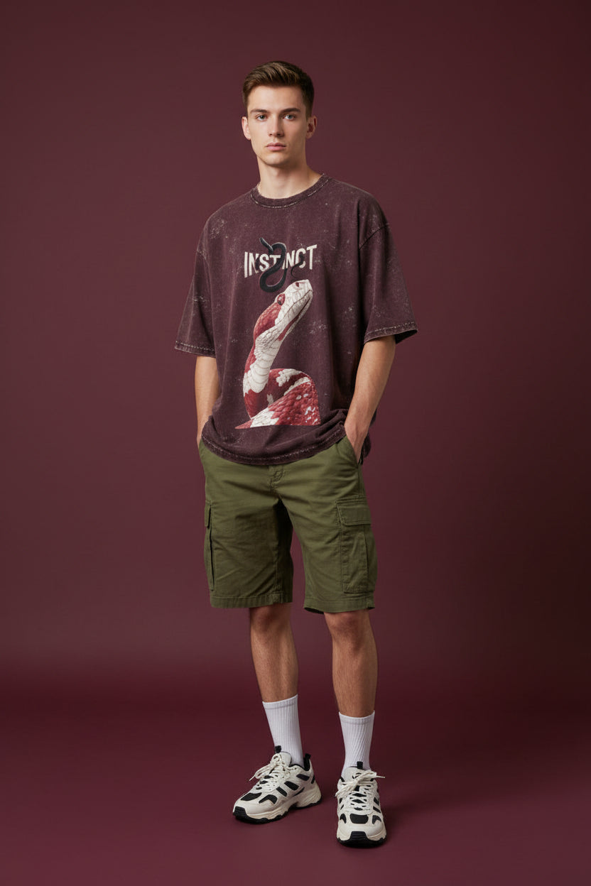 ZotRage Instinct oversized cotton t-shirt in dark acid-washed burgundy with a red and white snake graphic print.