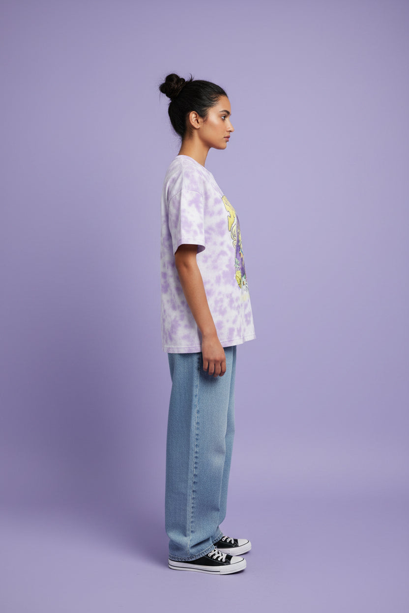 ZotRage white and lavender tie-dye oversized t-shirt with a celestial sun, moon, and butterfly graphic print.