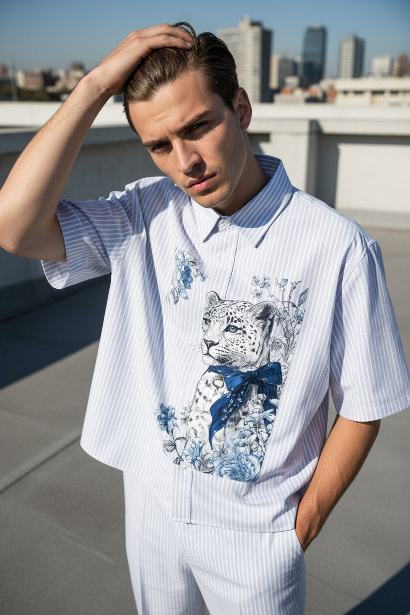 ZotRage boxy shirt in white with blue stripes featuring a detailed leopard and floral graphic print on the front