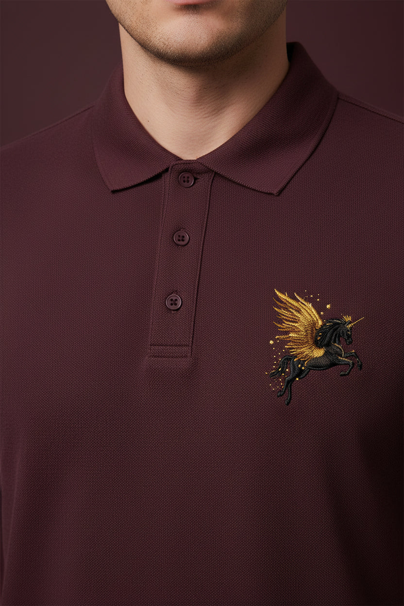ZotRage maroon cotton polo shirt with a small golden horse logo on the chest and a structured collar.