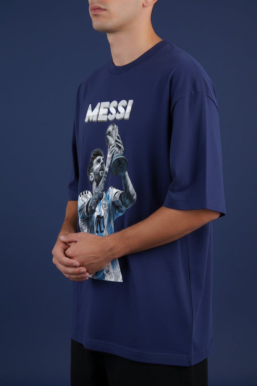 ZotRage royal blue oversized cotton t-shirt featuring a graphic print of Lionel Messi holding the World Cup trophy.