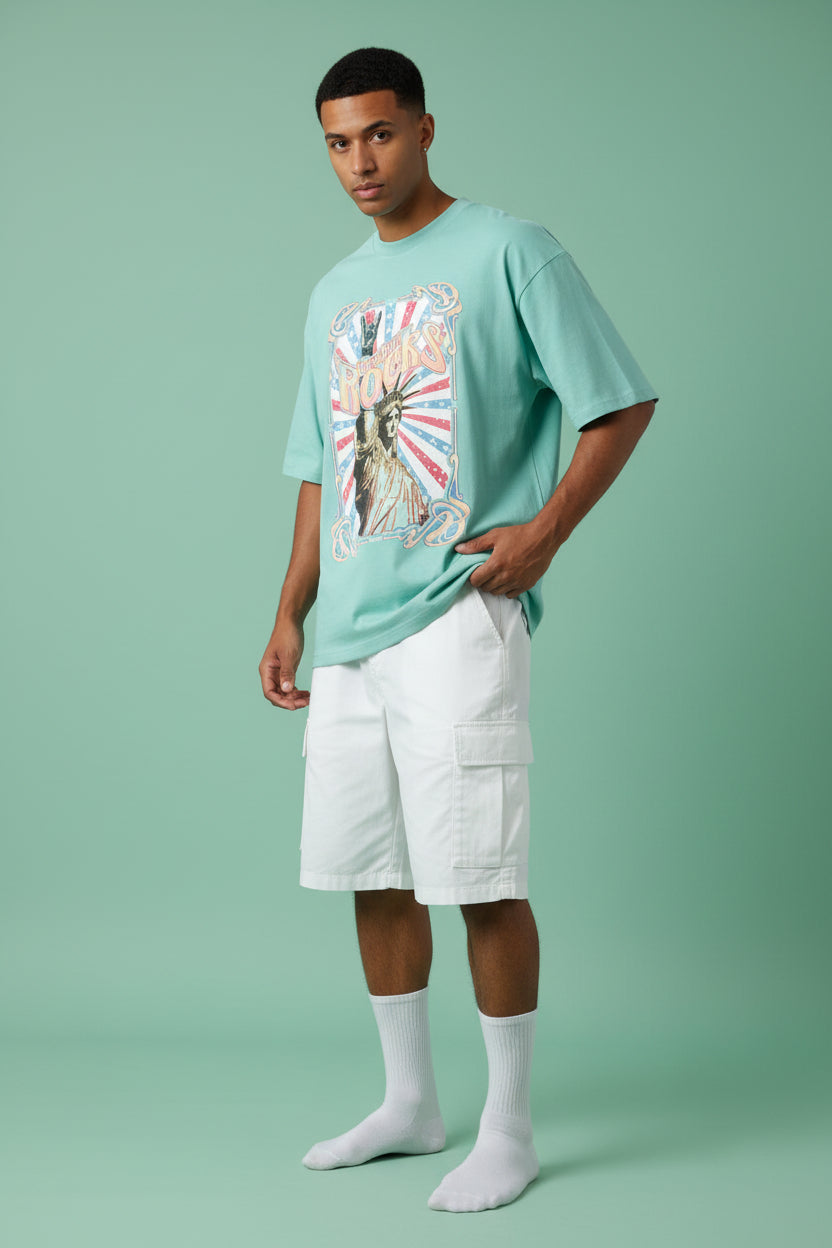 ZotRage mint green oversized cotton t-shirt featuring a vintage Statue of Liberty Freedom Rocks graphic print
