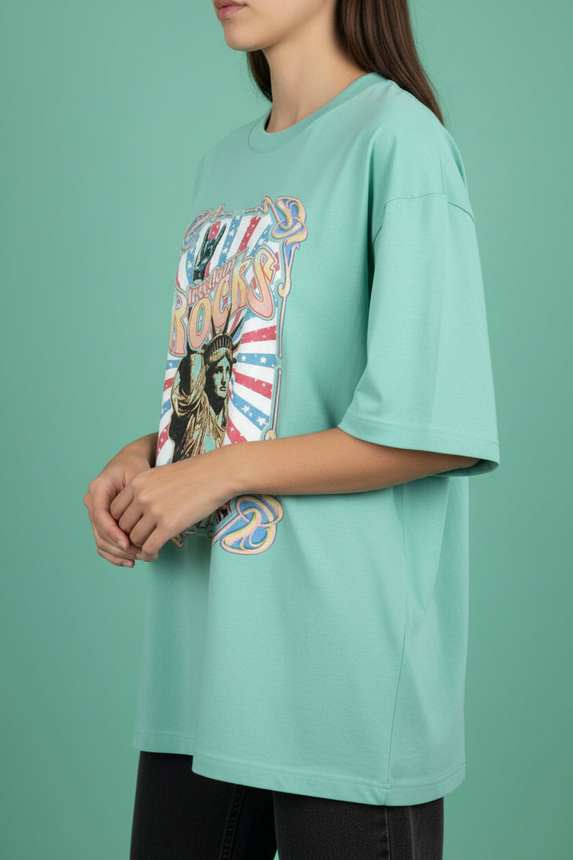 ZotRage mint green oversized cotton t-shirt featuring a vintage Statue of Liberty Freedom Rocks graphic print