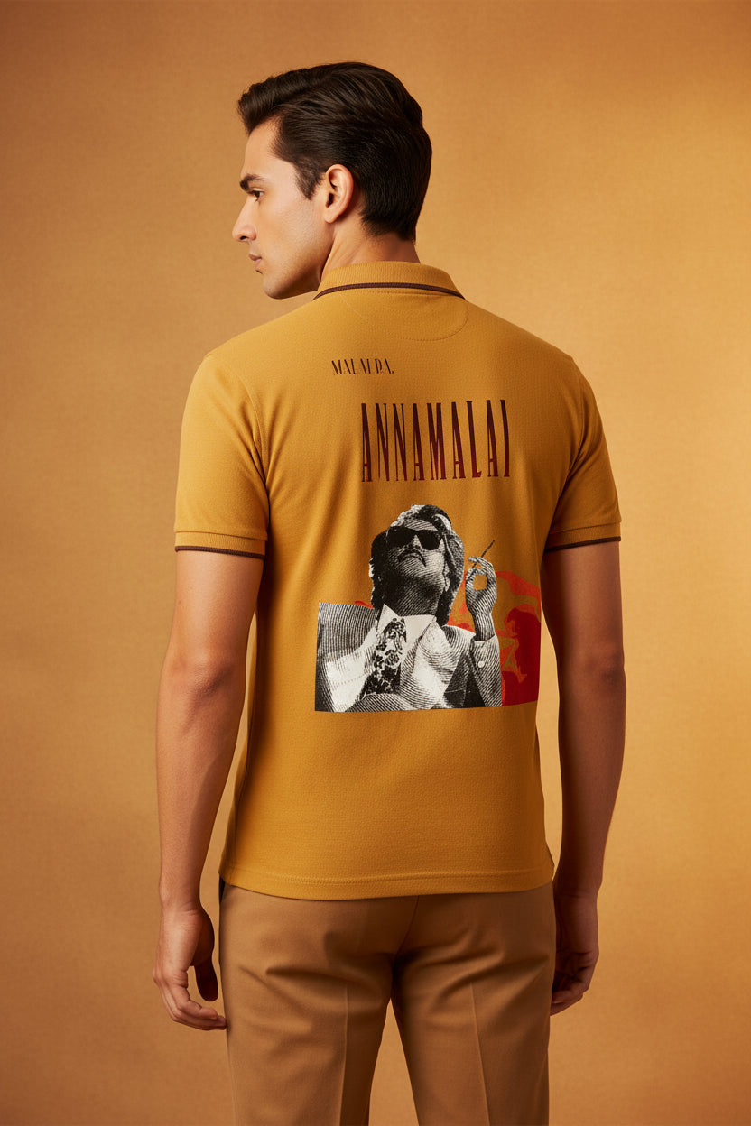 ZotRage mustard yellow cotton polo shirt with Annamalai movie graphic print on the back and textured Airtex finish