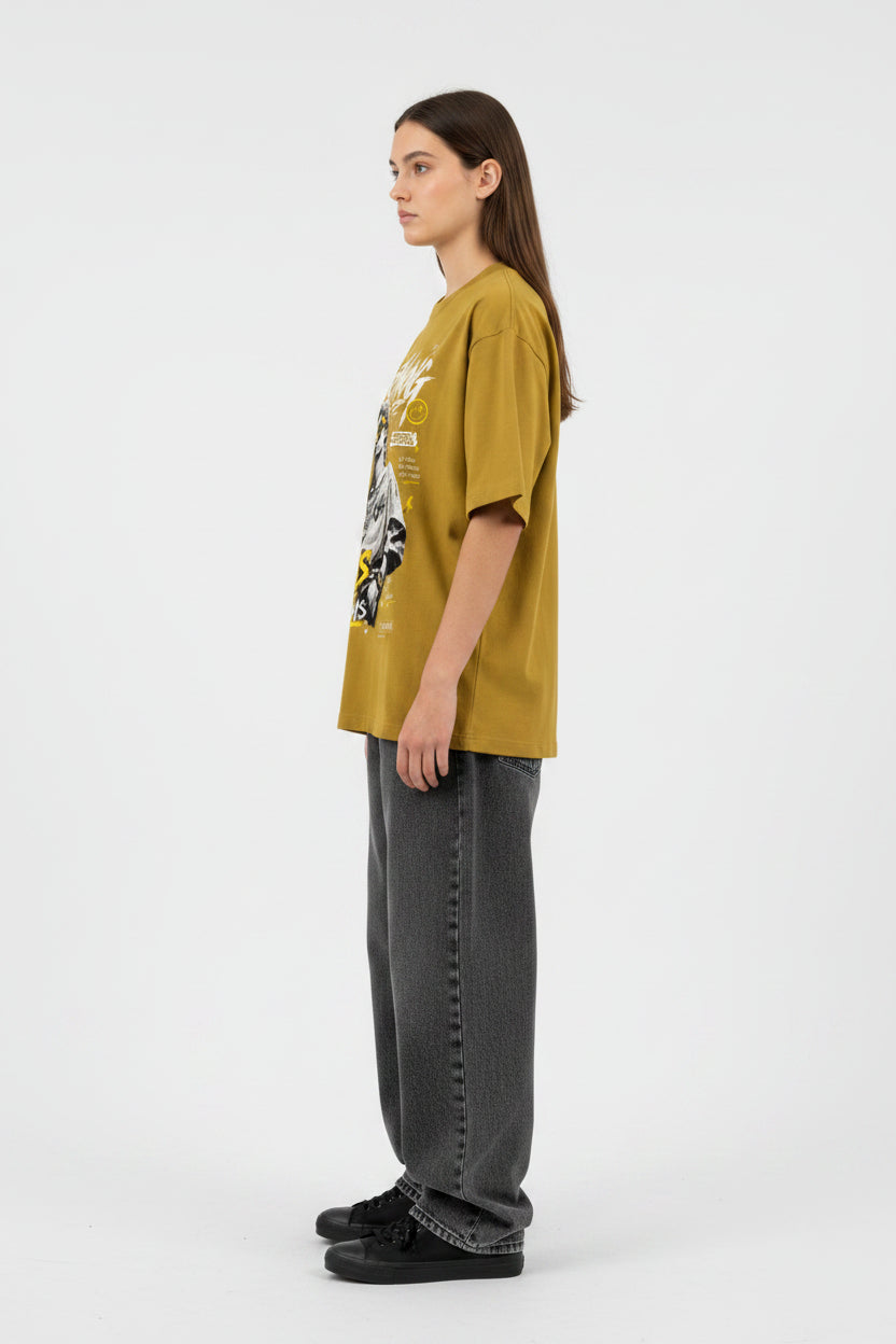 ZotRage mustard yellow oversized cotton t-shirt with graphic print of a statue wearing sunglasses and holding a cup.