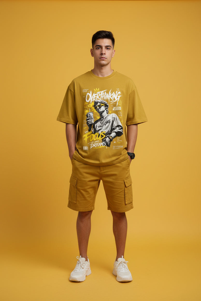 ZotRage mustard yellow oversized cotton t-shirt featuring a graphic print of a statue with sunglasses and text.