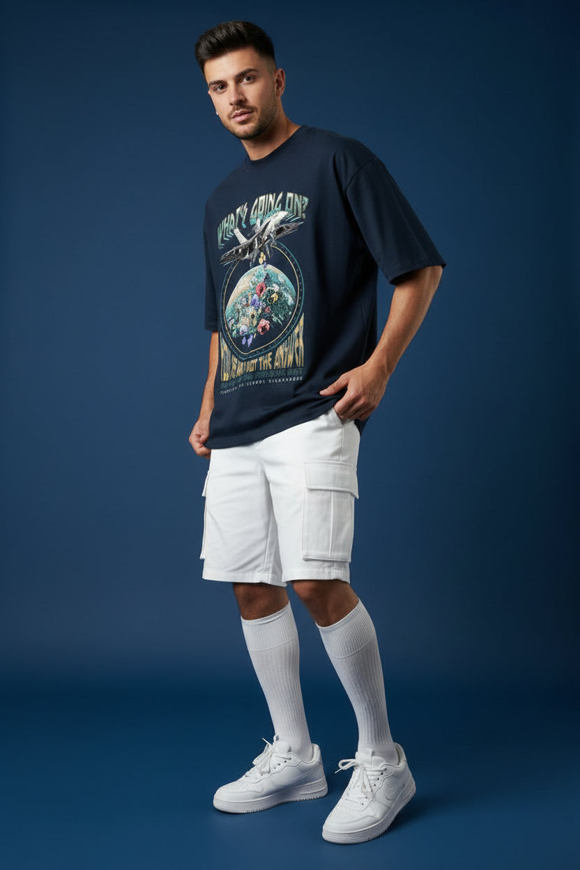 ZotRage navy blue oversized cotton t-shirt featuring a graphic print of a fighter jet over a floral earth design.