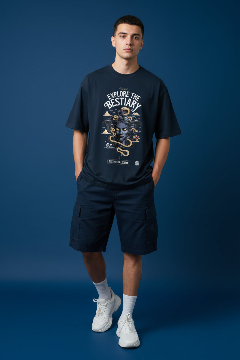ZotRage navy blue oversized cotton t-shirt featuring a graphic print of Medusa with snakes and landscape elements.