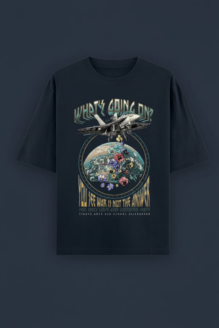ZotRage navy blue oversized cotton t-shirt featuring a vintage fighter jet and floral earth graphic print.