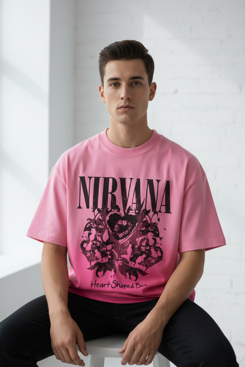 ZotRage Nirvana Heart Shaped Box graphic t-shirt in pink with a sunfade ombre wash and boxy fit.
