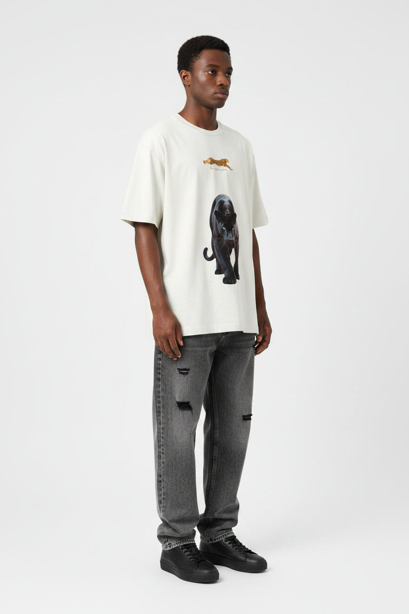 ZotRage off-white oversized t-shirt featuring a large black panther graphic and a small leopard print design
