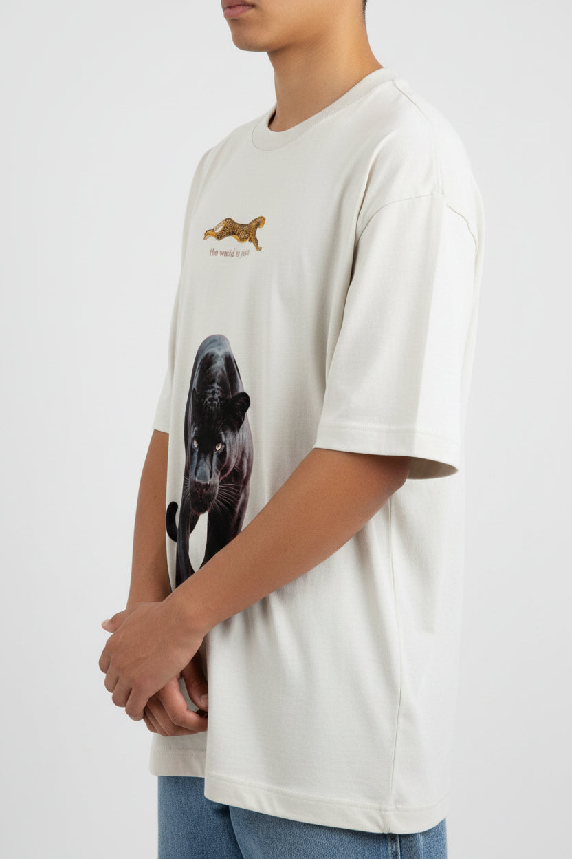 ZotRage off-white oversized t-shirt featuring a large black panther graphic and a small leopard print detail