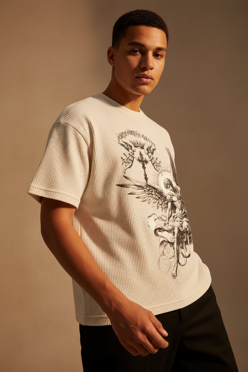ZotRage off-white waffle knit boxy t-shirt with a detailed black graphic of an angel, sword, and crown.