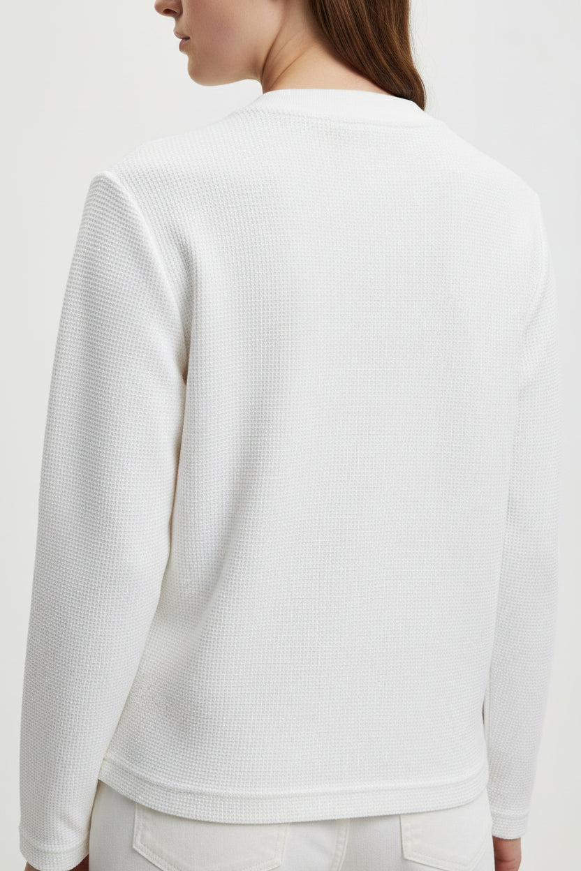 ZotRage off-white waffle knit long-sleeve shirt with a relaxed, oversized fit and textured cotton fabric.