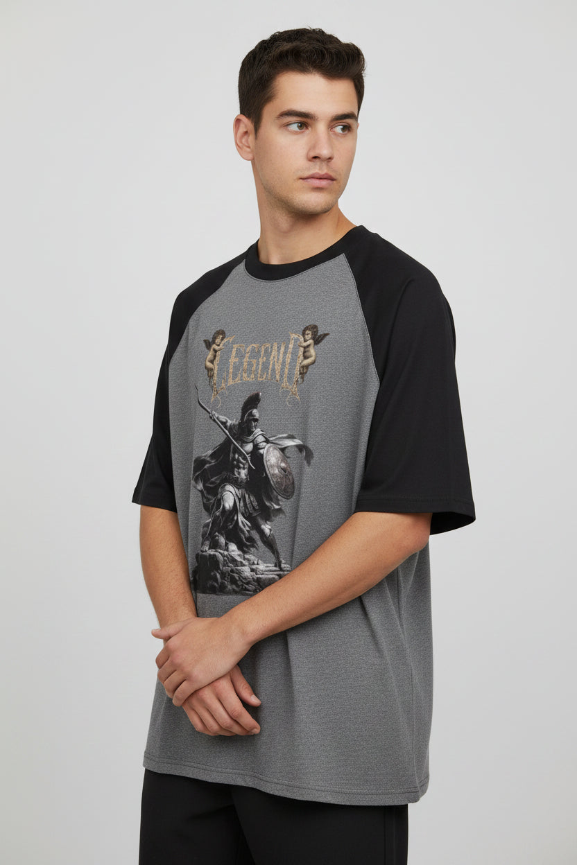 ZotRage oversized raglan t-shirt in black and charcoal melange cotton with a graphic warrior print on the front.
